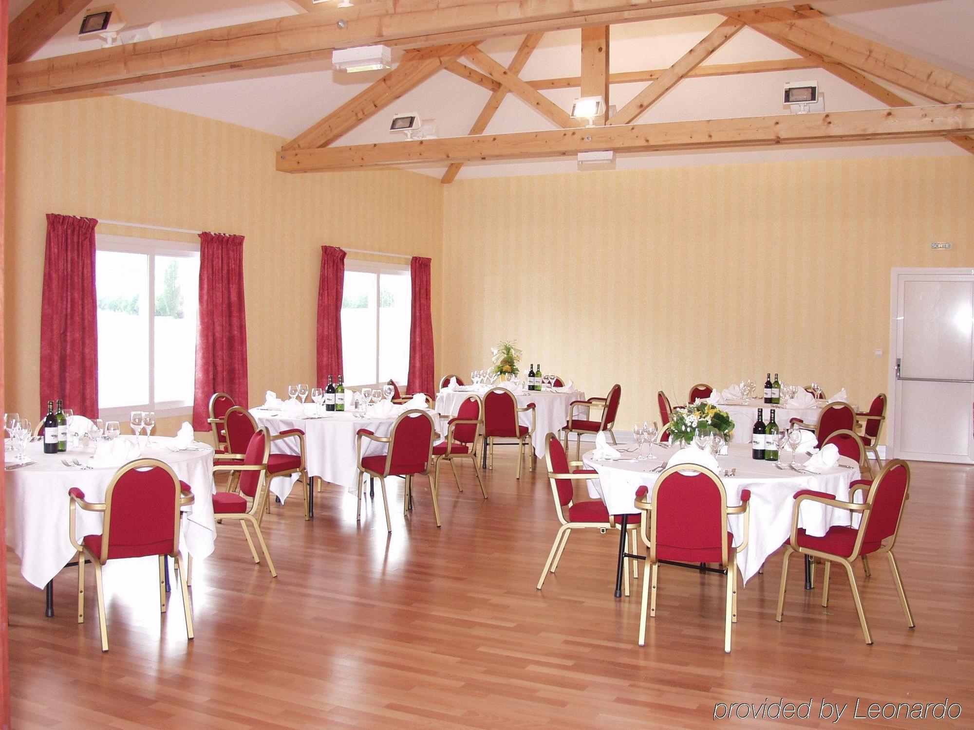 อพาร์ตโฮเต็ล อะดาจิโอ เจนีฟ ชองต์ เจนีส พัวอิลลี Aparthotel ธัวรี ร้านอาหาร รูปภาพ